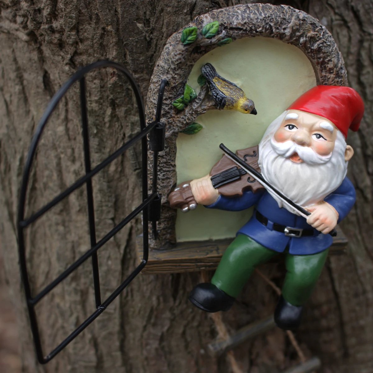 1 resin handicraft hanging from a dwarf playing piano tree, iron window, hanging tree, decorating courtyard tree trunks, hanging