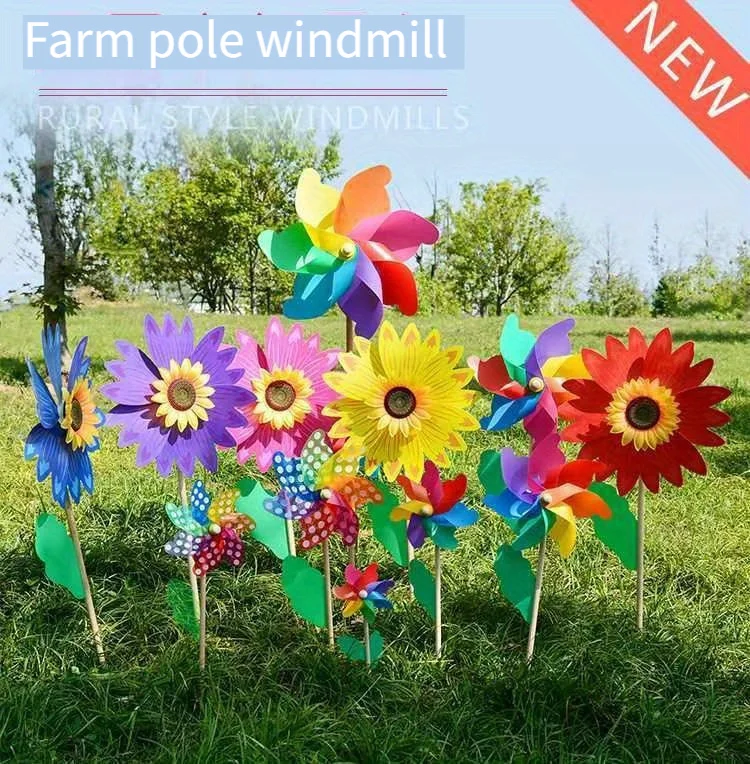 Colorful windmill outdoor decoration festival scenic park children holding rotating wooden color windmill